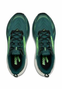 Jooksejad, millel on tume teali värvi mesh ülemine osa, laimerohelised aktsendid, mustad paelad ja valge tald, loodud mugavuse ja toe tagamiseks.