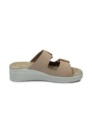 Sandal in pelle beige con piattaforma, dotata di due fasce larghe, dettagli in metallo dorato e suola imbottita. Suola testurizzata per una migliore aderenza.