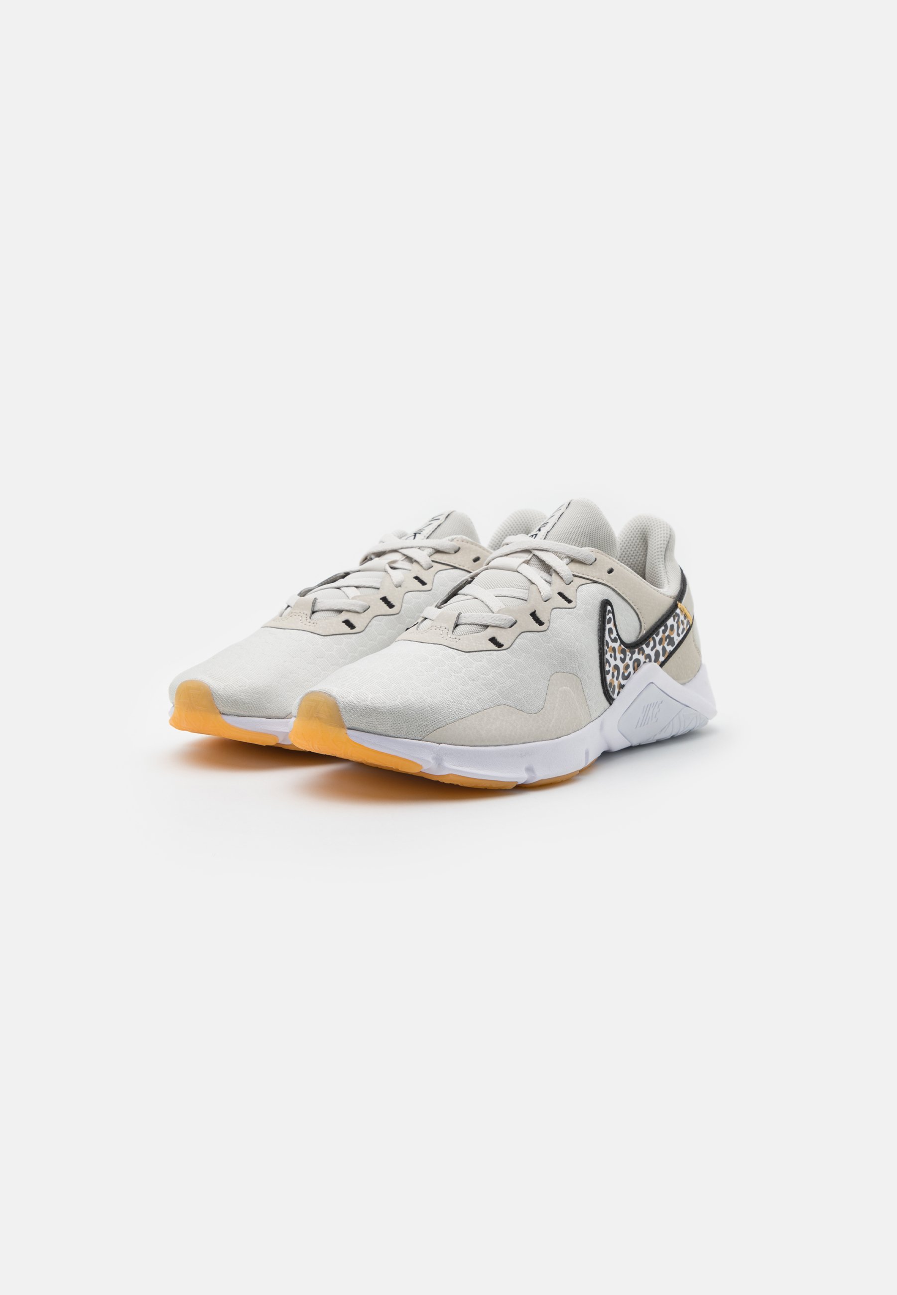 Nike Performance LEGEND ESSENTIAL 2 PRM - Training shoe - light  bone/black/wheat/white/light brown/beige - Zalando.co.uk