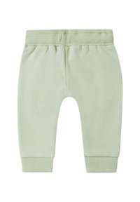Lichtgroene katoenen sweatpants met geribde tailleband en boorden, met een zachte textuur en een relaxte pasvorm.