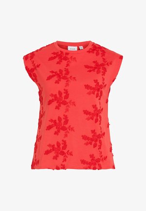 Crveni top bez rukava s okruglim izrezom i teksturiranim cvjetnim vezom ravnomjerno raspoređenim po tkanini.