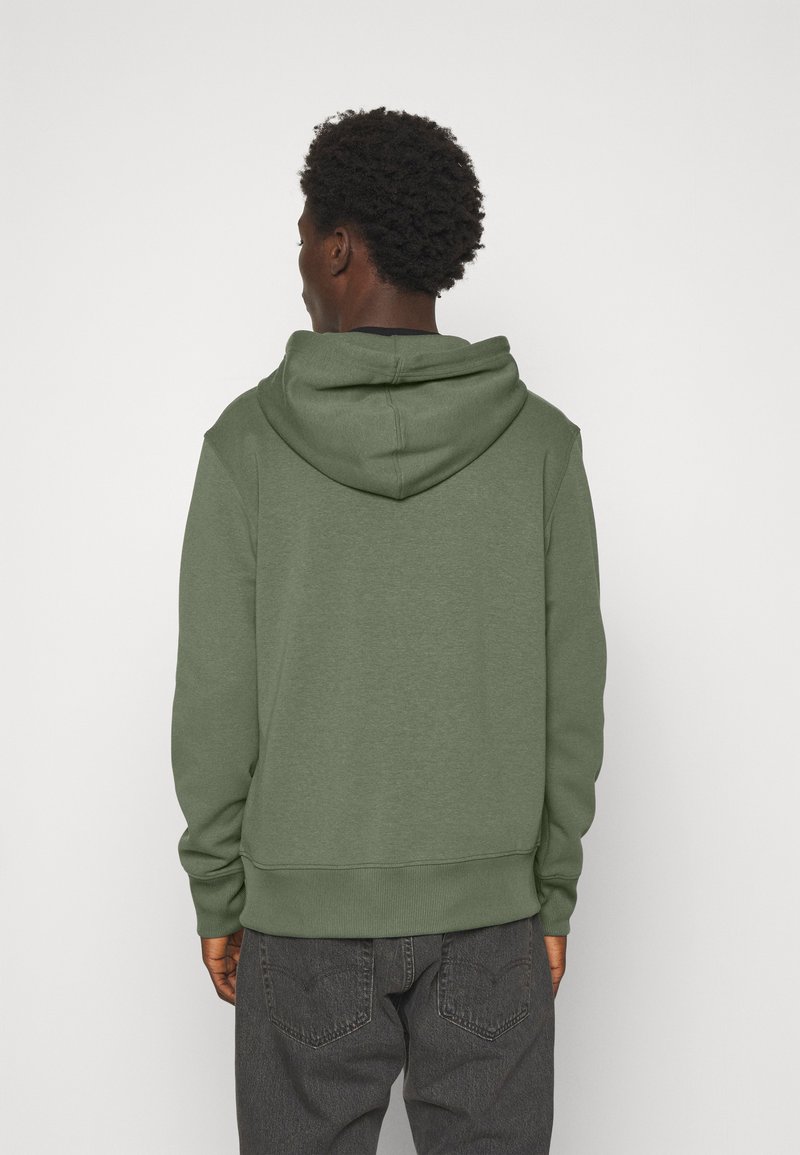 Calvin Klein Jeans MIX MEDIA ZIP THROUGH HOODIE GENDERLESS UNISEX - Zip-up  sweatshirt - thyme/khaki - Zalando.co.uk