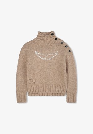 Beige knitted turtleneck sweater with white wing design on chest and five black buttons along the left shoulder seam.