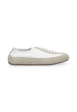 White and beige low-top sneaker with suede detailing, lace-up front, and "CANDICE COOPER" branding on the side.