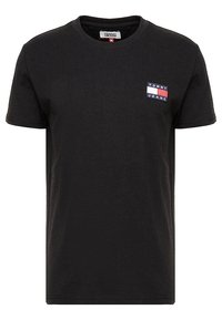Černé bavlněné tričko, kulatý výstřih, krátké rukávy, s malou vícebarevnou nášivkou "Tommy Jeans" na levé hrudi.