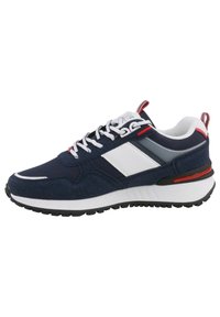 Navy blue athletic shoe with a suede upper, white and gray accents, black rubber sole, and red details on the heel and tongue.