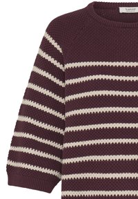 Maroon knitted sweater with cream horizontal stripes, featuring a ribbed neckline and cuffed, three-quarter length sleeves, textured fabric.
