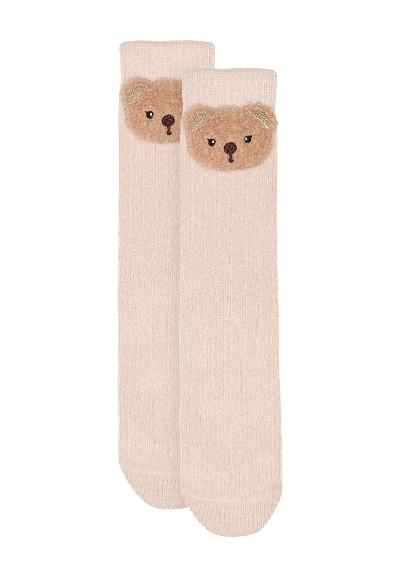 Knælange beige strømper med et tekstureret bjørneansigt på manchetten, med broderede øjne og ører i bløde brune og cremefarver.