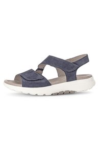 Marineblauwe suède sandalen met een open teenontwerp, kruisbanden en verstelbare achterkant. Voorzien van een gevoerde witte rubberen zool.