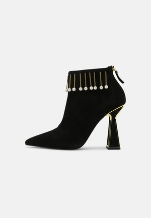 LUCIE - Ankle boots - black