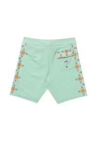 Costumi da bagno verde menta con un motivo floreale in rosa e beige lungo i lati; presenta una tasca posteriore con patta e un'etichetta con logo.