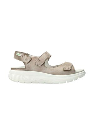 Sandale beige à bout ouvert avec deux sangles Velcro réglables et une semelle blanche épaisse conçue pour le confort et le soutien.