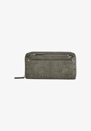 Olive green wallet with embossed crocodile texture, zip closure, and multiple compartments. Smooth fabric with silver-tone hardware accents.