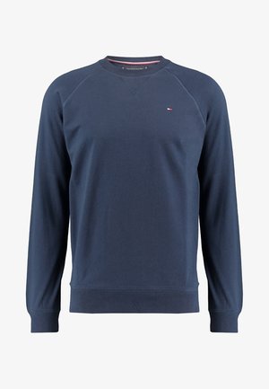 Marineblaues Sweatshirt mit langen Ärmeln und Rundhalsausschnitt, kleinem Tommy Hilfiger-Logo auf der Brust und gerippten Bündchen und Saum.