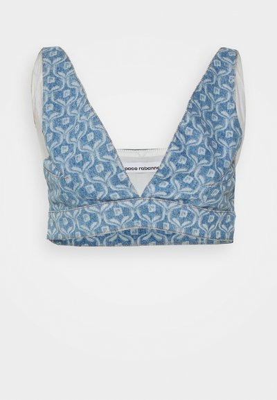 Bralette de denim com decote em V, apresentando um padrão azul e forro branco. O tecido tem um acabamento texturizado com costuras visíveis.