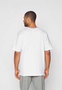 Nike Performance NBA CITY EDITION CHICAGO BULLS TEE - T-shirts - white