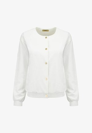 Biała kardigan z okrągłym dekoltem, przednimi zatrzaskami, prążkowanymi mankietami oraz luźnym krojem. Tkanina wydaje się miękka o gładkiej fakturze.