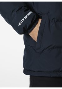 Helly Hansen YU 23 REVERSIBLE PUFFER - Chaqueta de invierno - navy