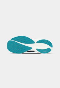 Shoe sole with a white base, featuring a textured turquoise pattern and red accents. Designed for traction and comfort.