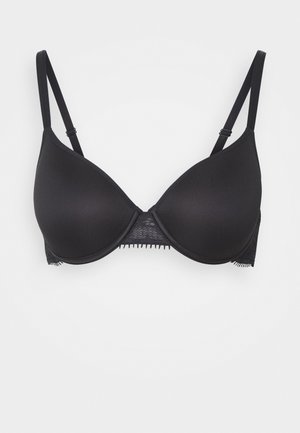 Black bra with padded cups and lace detailing at the back. Features adjustable straps and a smooth, seamless design.
