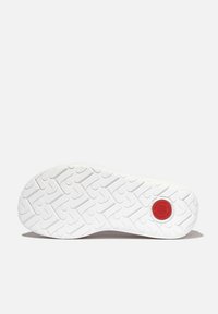 Witte rubberen schoenzool met een textured patroon en een rood, rond logo. Het ontwerp bevat verhoogde elementen voor grip.