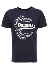 Camiseta de algodón azul marino con un gráfico circular blanco que presenta el texto: "Marca de Denim Original" y "Clothing Co. Personalizado" centrado en la parte delantera.