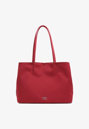 Red nylon tote bag with double handles, featuring a minimalist design and subtle logo detail at the base. Smooth texture, no patterns.