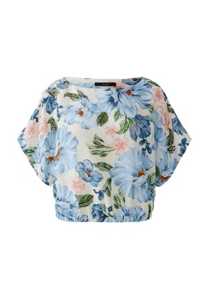 Losse blouse met korte mouwen en elastische zoom, witte achtergrond, groot blauw en roze bloemmotief met groene bladeren.