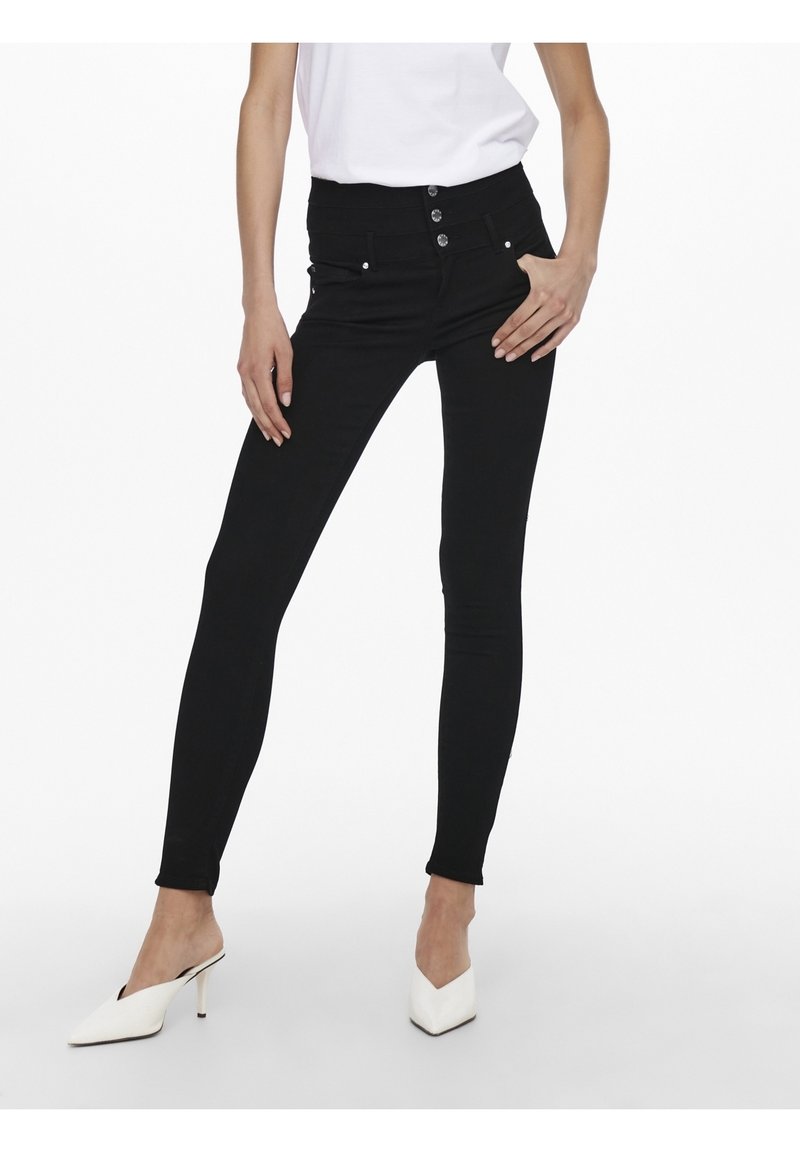 Jeans skinnies negros de cintura alta, con cierre de múltiples botones y bolsillos frontales. Textura suave, diseño ajustado, adecuado para diversos conjuntos.