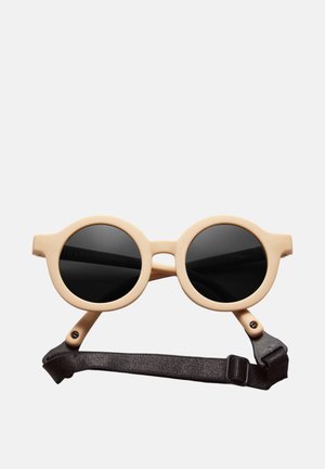 Beige runde Sonnenbrille mit schwarzen polarisierten Gläsern und einem verstellbaren schwarzen Band, das an den Bügeln befestigt ist.