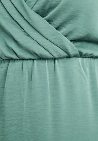 Vero Moda Curve VMCMARY ANKEL DRESS - Robe longue - dark forest