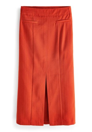 Jupe orange taille haute, longueur au genou, avec une fente centrale à l'avant et deux poches fendues horizontales près de la taille.