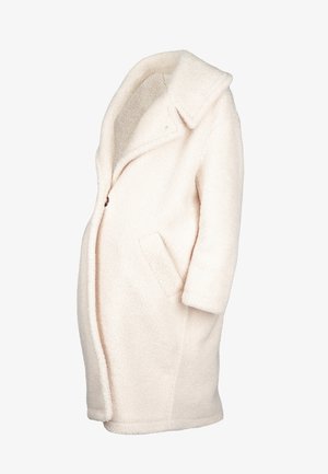 Manteau en polaire beige avec un col à cran, fermeture à bouton unique, poches latérales et tissu texturé, offrant une coupe décontractée et un design mi-long.
