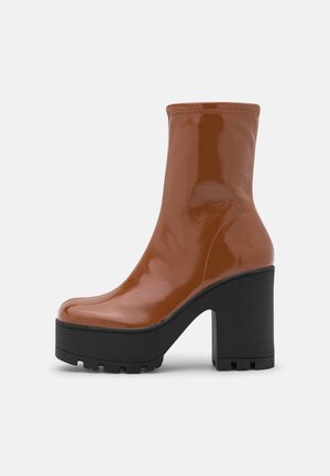 High heeled ankle boots - light brown