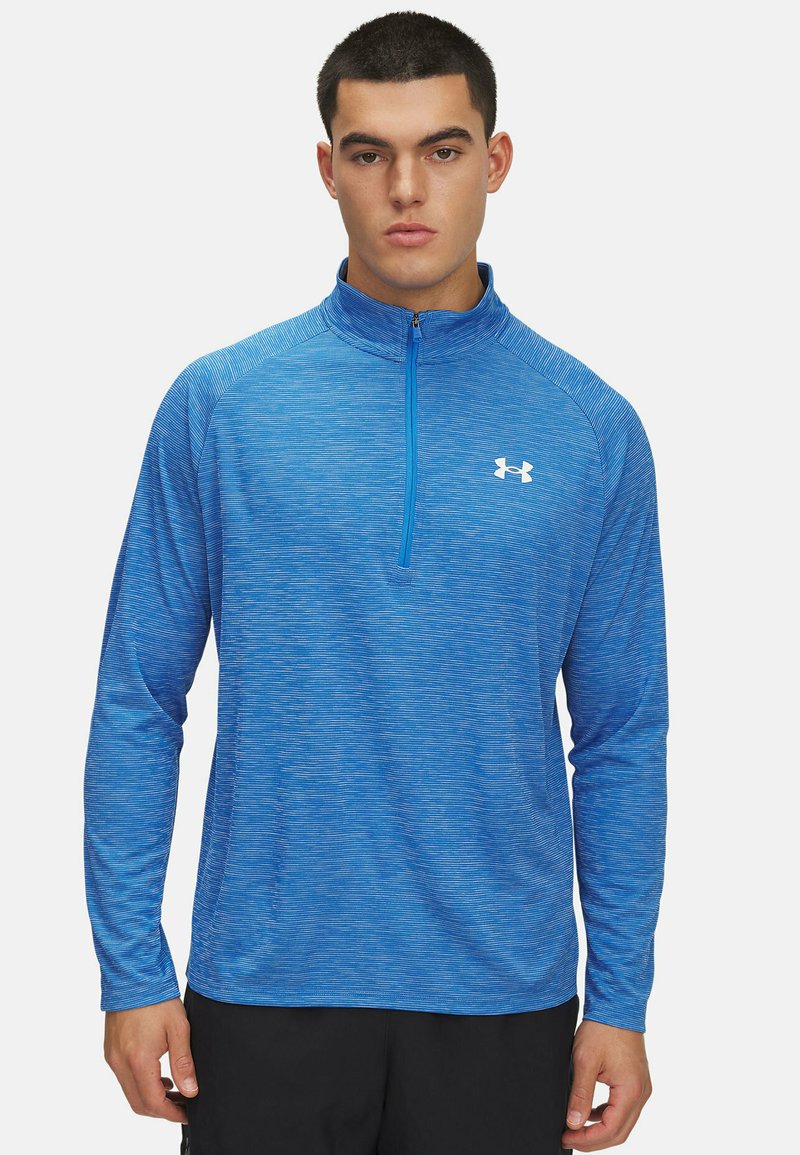 Langärmliger Pullover aus strukturiertem blauen Stoff mit einem Viertelreißverschluss, ausgestattet mit einem weißen Logo auf der Brust und athletic Fit.