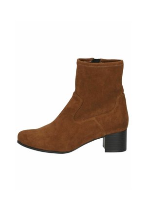 Brown suede ankle boots with a rounded toe, elastic side panels, and a block heel. The texture is soft, with visible stitching details.