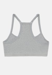 Reggiseno sportivo grigio con tessuto misto cotone, design a incrocio sul retro, spalline larghe e fascia elastica sotto. Texture liscia e finitura senza cuciture.