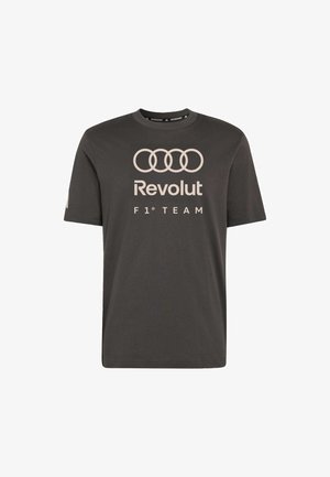 Zwart katoenen T-shirt met korte mouwen en een ronde hals. Heeft lichtgekleurde "Revolut"- en "F1 TEAM"-logo's aan de voorkant.