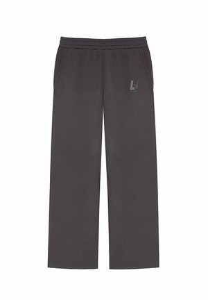 Dunkelgraue, weit geschnittene Sweatpants mit elastischem Bund, Seitentaschen und kleinem Logo auf dem oberen linken Oberschenkel.
