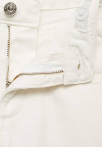 White denim pants with a front zip and button closure, featuring subtle texture and stitched details along the waistband and pockets.