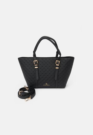 Black tote bag with a textured pattern, gold hardware accents, double handles, and a detachable strap for versatility.