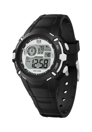 Montre numérique avec un bracelet en caoutchouc noir, dotée d'un cadran noir et blanc, de deux cadrans analogiques et de boutons de contrôle. Résistante à l'eau jusqu'à 100 m.