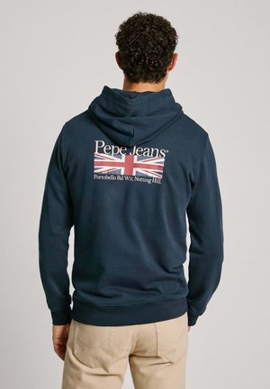 Sudadera de color navy hecha de algodón, con un bolsillo frontal tipo canguro, capucha con cordón y un gráfico de la bandera británica en la parte posterior.