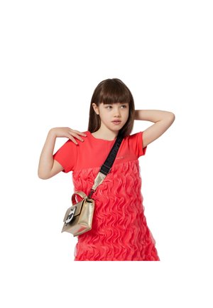 Red dress with textured ruffles, short sleeves, and a black strap handbag, featuring a gold finish and an accent clasp.