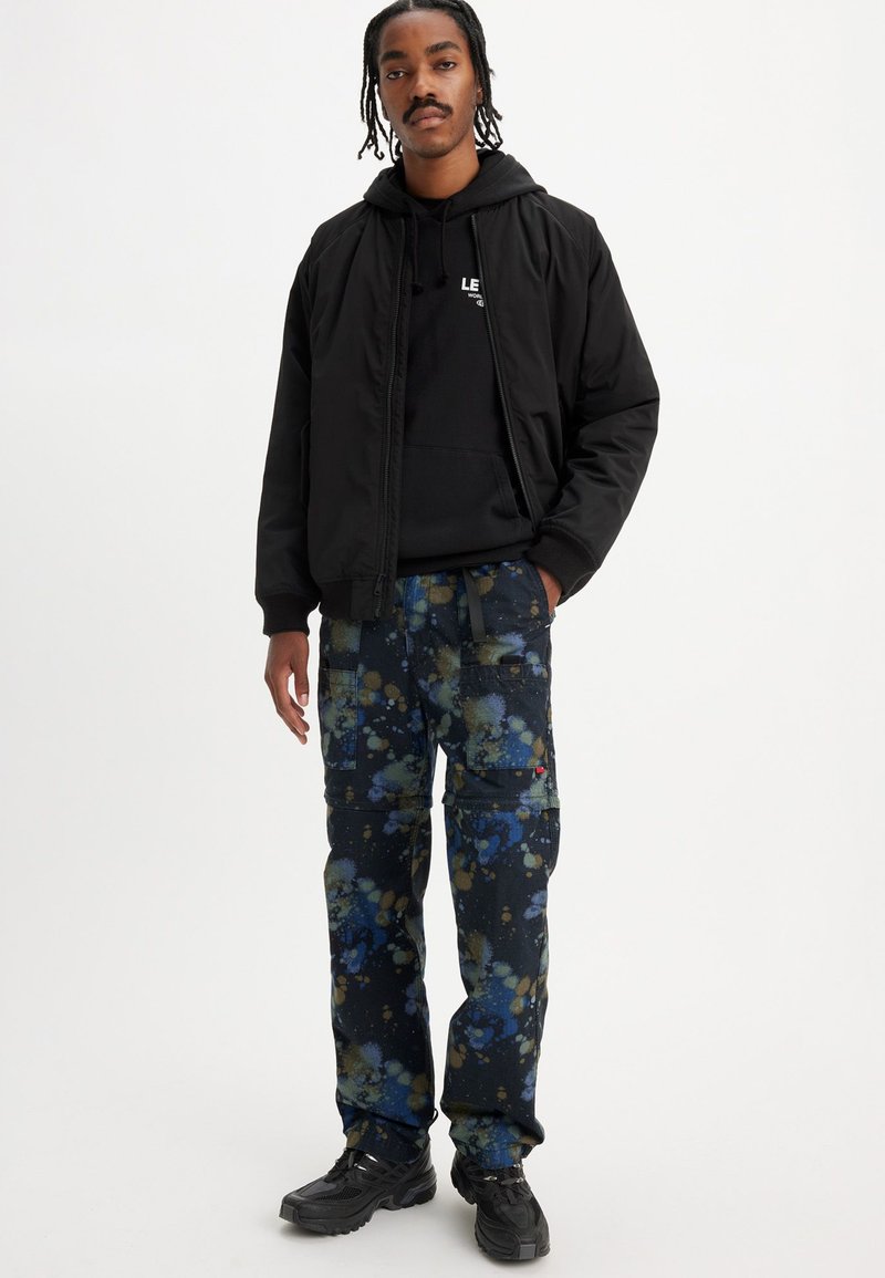 Levi's® UTILITY ZIP OFF PANT Cargobukse splatter paint meteorite
