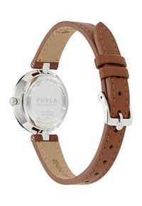 Montre avec bracelet en cuir brun et boîtier en acier inoxydable argenté. Le dos affiche la marque "FURLA" et les détails de résistance à l'eau. Design minimaliste.