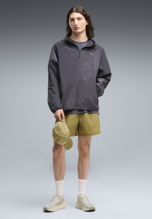 Puma, RUN CULTURE COLLECTIVE T7 RELAXED TRAININGSJACKE - Veste de survêtement - inky depths