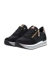 Black athletic shoes with a textured suede upper, gold zipper accent, and a white and black striped sole. Leopard print detail at the heel.