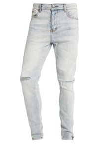 Hellblaue Skinny-Jeans mit ausgefransten Kniedetails, Fünf-Taschen-Design, metallischem Knopfverschluss und dezentem Verblassen.