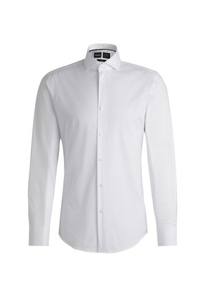 White long-sleeve button-up shirt with a pointed collar, made from smooth fabric. Features a curved hem and pearly buttons along the front.
